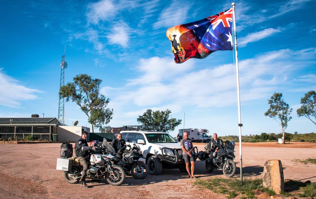 After travelling 1240km from Wagga Wagga by motorbike and 4WD, 'the RAAFies' as they called themselves, arrive at Cameron Corner on April 24 to attend the Anzac Day Dawn Service. Picture: Tim Rumble