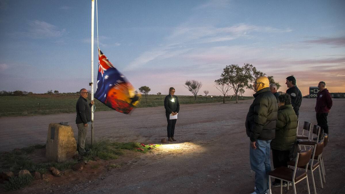 Michelle Partridge lead the Cameron Corner Anzac Day Dawn Service which attracted participants from South Australia, New South Wales and Queensland. Picture: Tim Rumble