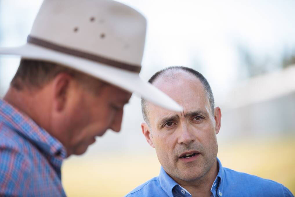 Vodafone chief executive officer, Inaki Berroeta, talks with Deputy Prime Minister Barnaby Joyce (left) in North West NSW after switching on one of the telco's new mobile blackspot towers sites.