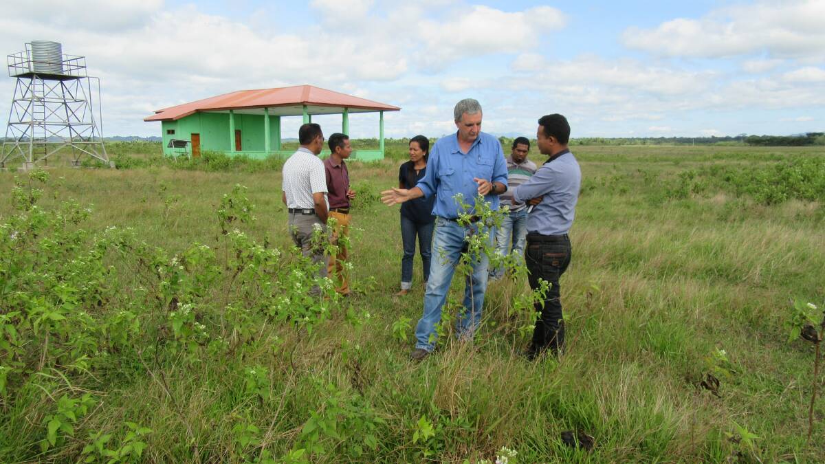 Virology technician Neville Hunt, from the Northern Territory Department of Primary Industry and Fisheries’ Berrimah Veterinary Laboratory, with Timor-Leste government representatives investigating a site for a sentinel herd.