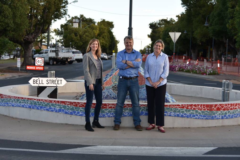 University of Queensland's Nicole Gillespie, Andrew Garnett and Katherine Witt in the main street of Chinchilla. 
