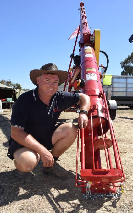 Andrew Venning, Vennings Machinery, Kadina, SA, with one of the company's range of augers at the Wimmera Machinery Field Days earlier in the month.