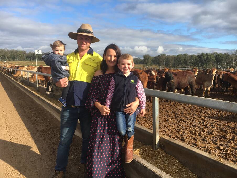 Lachy and Emma Brown with their children Frankie and Louis on-property at
Pakaderinga Feedlot.