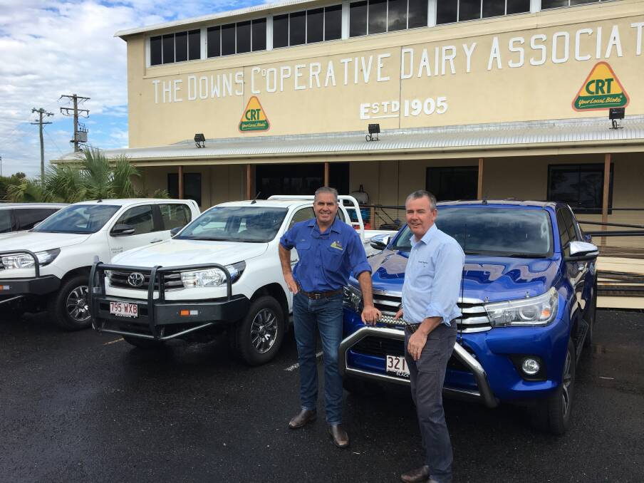 Great relationship: Black's Russell Edwards (right) with loyal Black Toyota client John Cullen, Dalby Rural Supplies with part of his Toyota Fleet.