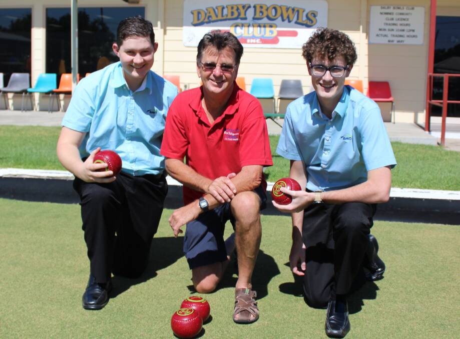 HERE TO HELP: BMO’s Oliver Holcombe and Ryan Troe with Rick Bellgrove from Dalby Bowls Club preparing for the upcoming carnival in which BMO is a major sponsor.