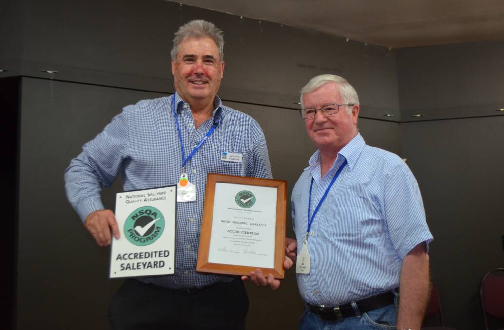 Ray Brown received the NQSA accreditation certificate for the Dalby Saleyards from   NQSA president Ian O’Loan.