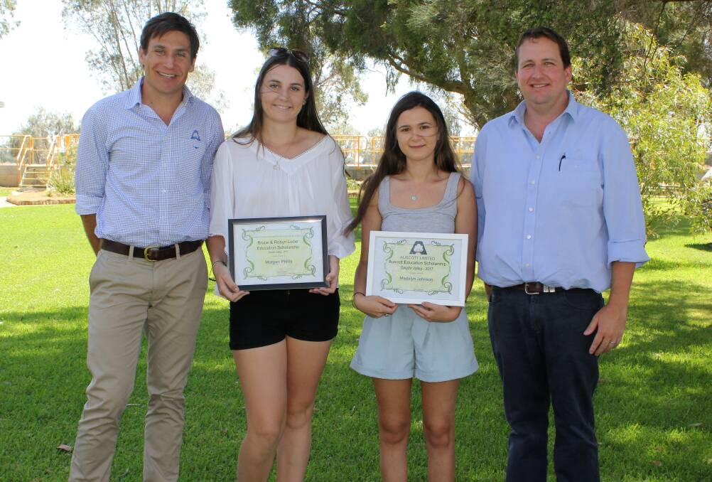 Auscott Gwydir Valley grower services rep Ben Jackman and general manager Sean Boland with the two scholarhsip winners, Morgan Phillis and Madelyn Johnson.