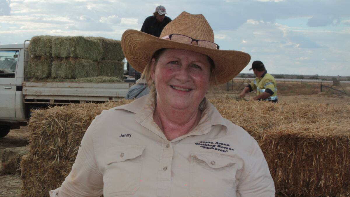Hot and dusty after a day managing the hay allocations, Aramac's Jenny Todd still had time for a smile.
