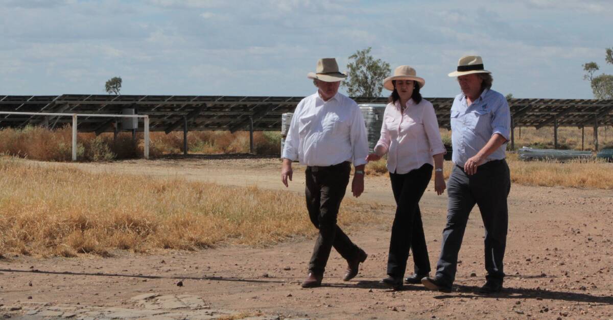 Wild dog fence commissioners Vaughan Johnson and Mark O'Brien with Premier Annastacia Palaszczuk in Barcaldine in May.