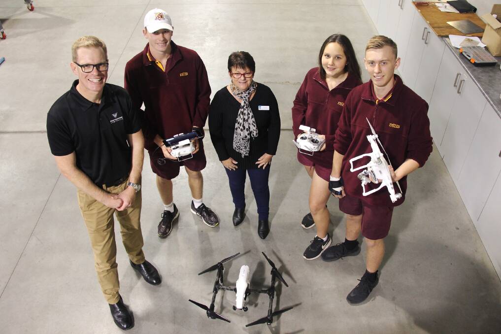 Up up and away: Remote Aviation Australia flight training manager, Andrew Learmonth and Western Downs Regional Council representative, Donna Ashurst spoke about uses for drones with Dalby State High School Year 11 students recently. Photo: Western Downs Regional Council.