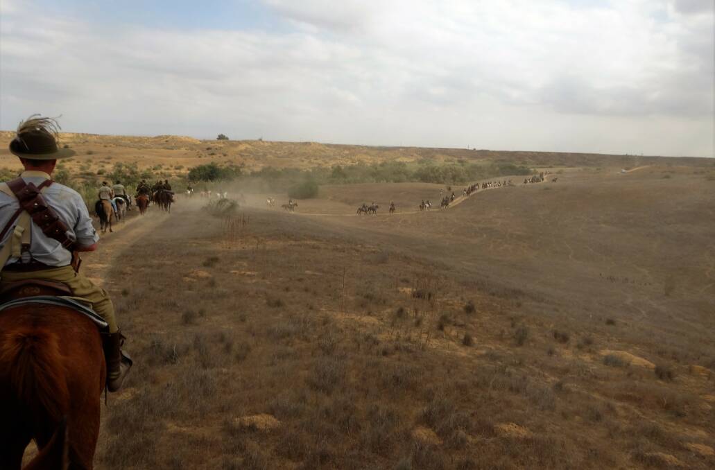 Just as they did 100 years ago, Australian Light Horse troops strung out across the Negev Desert on their way to a re-enactment of the famous charge at Beersheba.