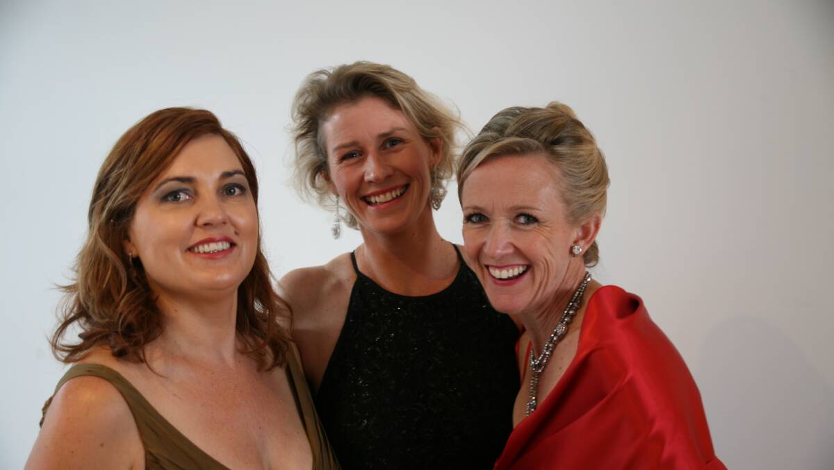 Former Longreach local, Inky Barwick (nee Starky), centre, flanked by her event helpers Liz O'Connell and Georgina Patterson.