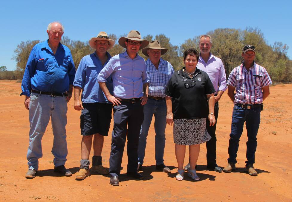 Agriculture Minister, David Littleproud, centre, with Murweh mayor, Annie Liston, Indigenous Affairs Minister, Nigel Scullion, and local landholders, Bean and Stephen Schmidt, and Peter and Kane Lucas.