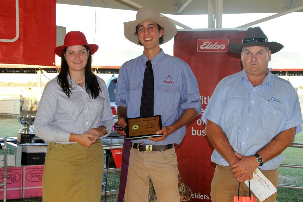 Winners are grinners: Queensland Country Life Miss Showgirl 2017, Claire Jackson, with Queensland's junior wool judge, Reilly Gall, Egelabra, NSW, and AWN Longreach representative, Greg Hunt. Pictures: Sally Cripps.