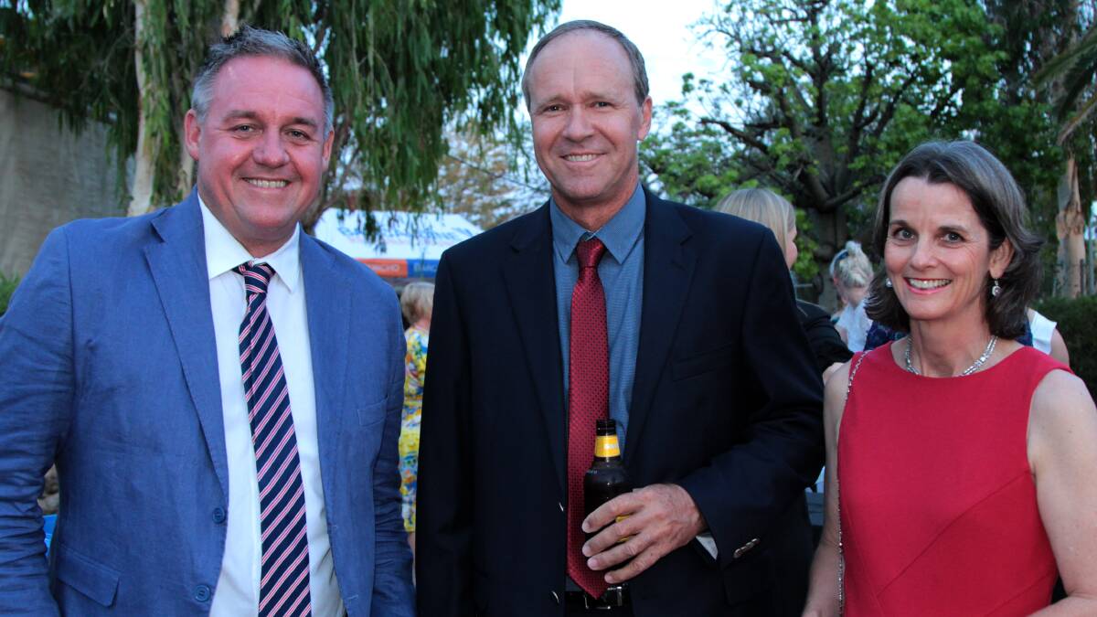Quilpie mayor and Outback Queensland Tourism chairman Stuart Mackenzie (centre) and wife Robyn, pictured with Queensland Weekender host Dean Miller at the Outback Queensland Tourism Association awards last year. The South West is preparing to release its own distinct tourism brand in Charleville next week.