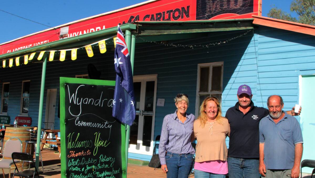 Brendan Farrell congratulated Wyandra publicans Paula and Russell Dawson, with Jan Lucas, as the convoy rolled out of the town on Friday morning.