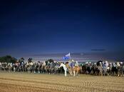 Participants in the Australian Campdrafting Association national finals paid tribute to Australia's Light Horsemen with a 140-strong turnout for a dawn service, organised by the Darling Downs branch of the Australian Stock Horse Society. Picture: Sara Jago