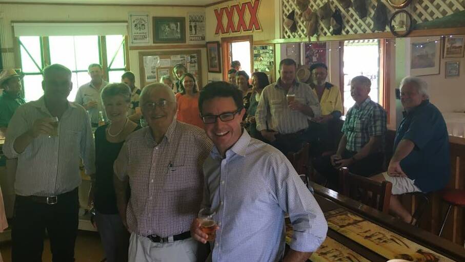 Cheers: Maranoa MP David Littleproud, centre, with state Member for Gregory Lachlan Millar and Yaraka publicans Gerry and Chris Gimblett and patrons. He said he would be back next year to toast the installation of the town's mobile phone tower. Photo: contributed.