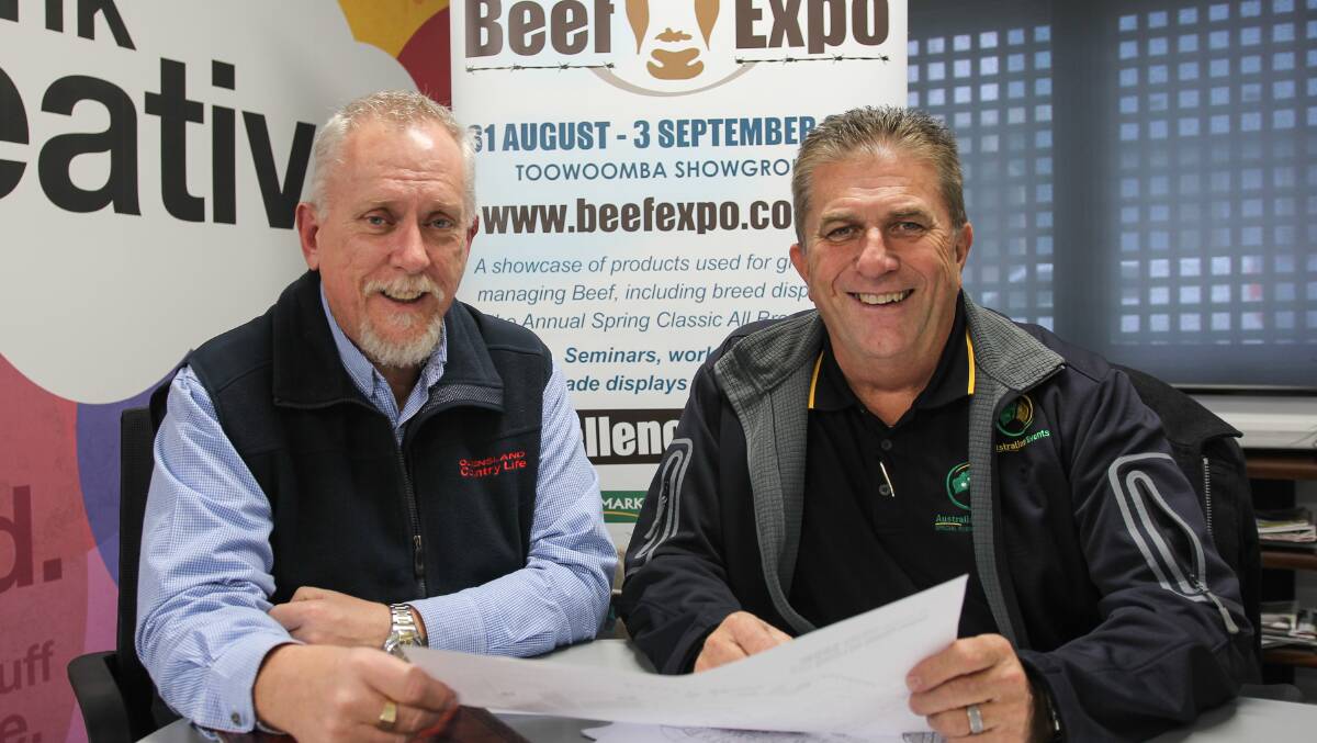 Welcome aboard: Queensland Country Life Toowoomba-based advertising sales representative Richard Watts (left) checks over the impressive exhibitor list for the inaugural Queensland Beef Expo with event owner, Australian Events’ managing director Bob Carroll.