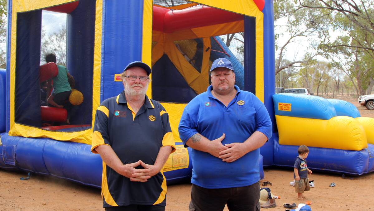 Charleville Rotary president Ric Newson and master of the Augathella lodge of Freemasons Dave Walters brought Christmas cheer to the families living around Scrubby Creek, south west of Tambo, on Saturday.