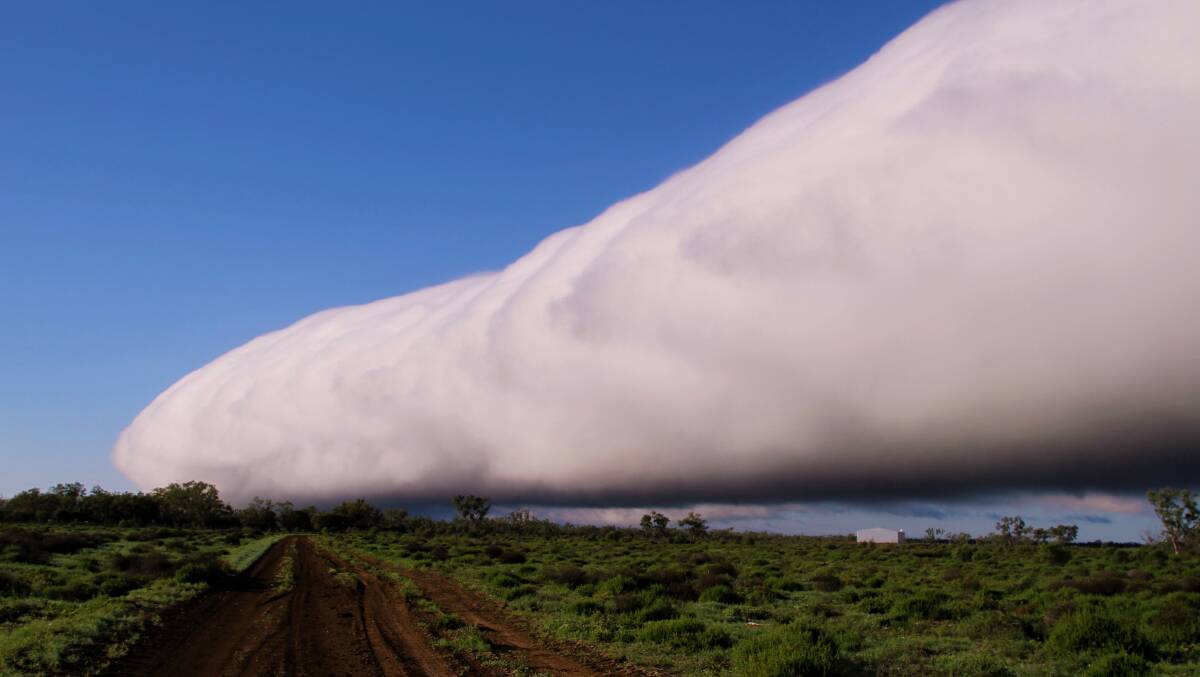Big beauty: Another view of the roll cloud associated with the cold front moving across the Queensland interior on Saturday morning. Photo: Michael Butler.