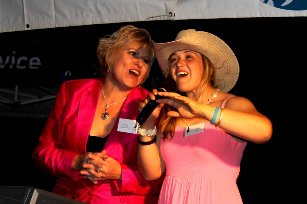 Entertainer Cathy Drummond and Maidie sing up a storm at Betoota for the 2014 Channel Country Ladies Day.