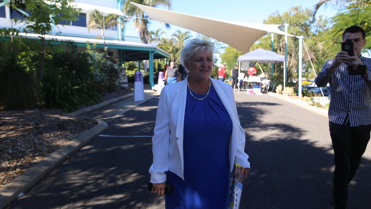 Close to call: The LNP's sitting member in Capricornia, Michelle Landry, walking in to cast her vote in Rockhampton today. The seat is one of the most marginal in Australia. Picture: Kelly Butterworth.