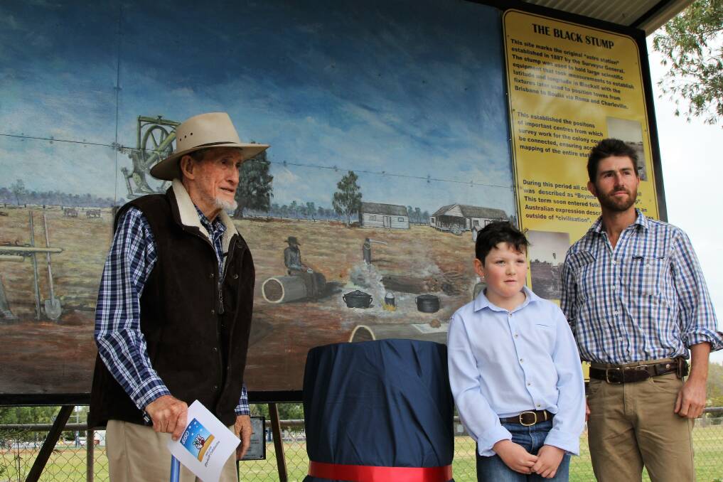 Strong foundations: Blackall historian, Fred Rich, sixth generation resident, Ryan Allan, and new resident, Sam Hart, unveil the new Black Stump marker as part of Blackall's 150th anniversary celebrations. Pictures: Sally Cripps.