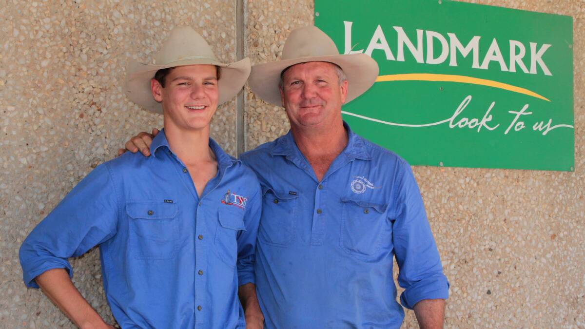 Generations of support: Boyd Curran, pictured with son Sam, is looking forward to creating an "old-fashioned" stock and station agency business in Queensland's central west.