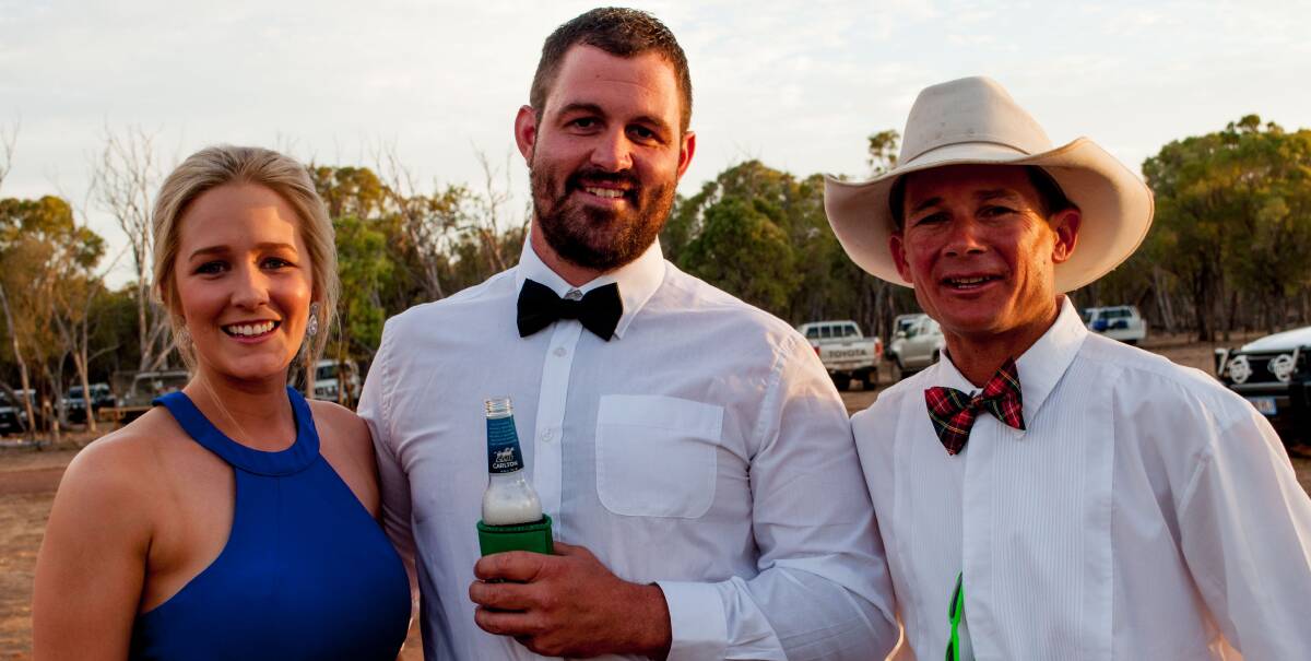 Chloe and Ryan Hodgkinson, along with Edwin Dennis, were all ready to party in the gidyea at Twin Hills, north west of Clermont.