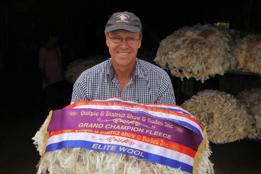 Broad ribbon: Show fleece prizes have come on top of record wool prices for Stuart Mackenzie at Plevna Downs, Eromanga. Picture: Sally Cripps.