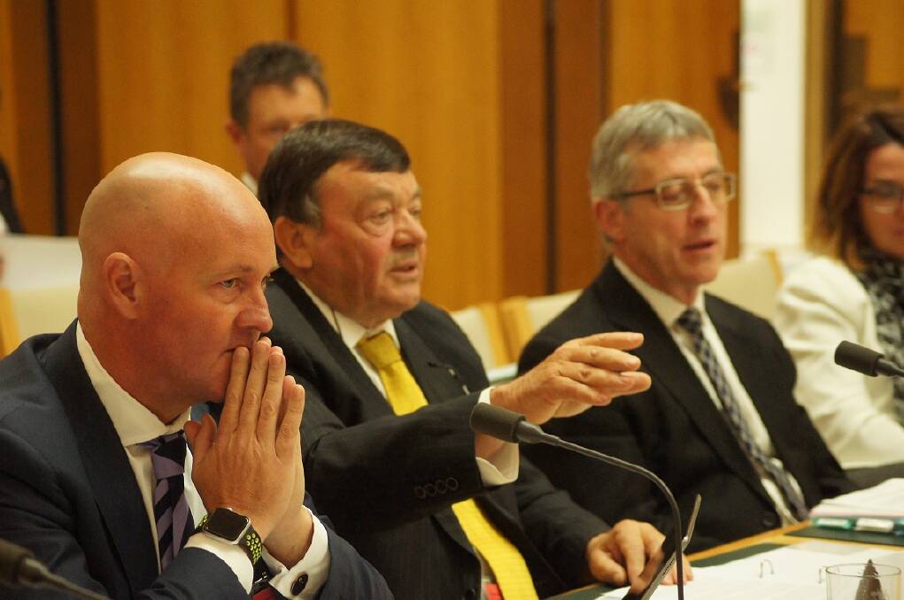 AWI chief executive Stuart McCullough, AWI chairman Wal Merriman and Department of Agriculture secretary Daryl Quinlivan, during Senate Estimates in Canberra recently. 