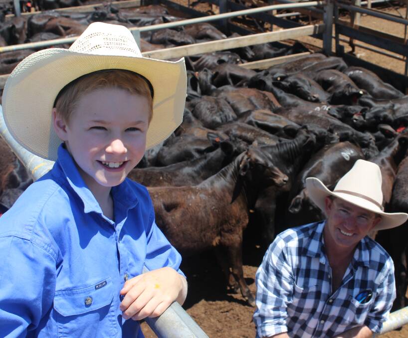 Plenty to smile about: Riley Sorensen, Westerdale, Injune, spent Tuesday at the Roma Store Sale with his dad, Taman. The Sorensens sold 454kg Brangus steers for 332c/kg or $1509/head. Picture: Penelope Arthur