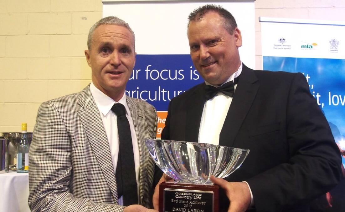 The 2015 Red Meat Industry Achiever David Larkin (right) with Fairfax Agricultural Publishing general manager John Warlters.