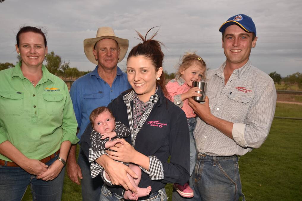 NQ Dry Tropics Grazing field officer Linda Anderson, Low Stress Stockhandling founder and principal trainer Jim Lindsay pictured with workshop hosts Strathalbyn Station’s Ureisha Hughes holding son Archie and Bristow Hughes holding daughter Brialie.