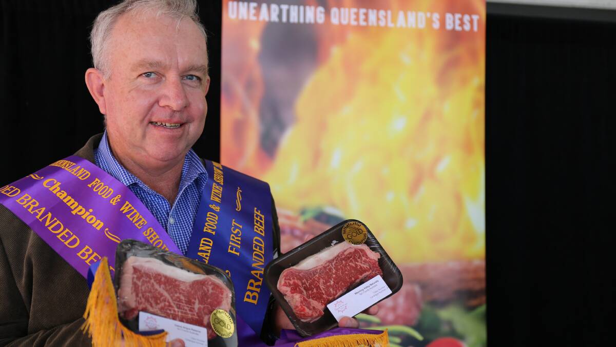 Oakey Beef Exports general manager Pat Gleeson with the gold medal winning Oakey Angus Reserve and the bronze Oakey Premium Wagyu.