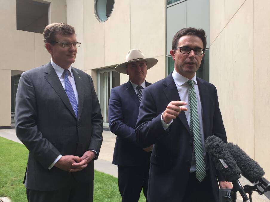 Agriculture Minister David Littleproud (right) speaking to media in Canberra this week and NSW Nationals MP Andrew Gee and party leader Barnaby Joyce.