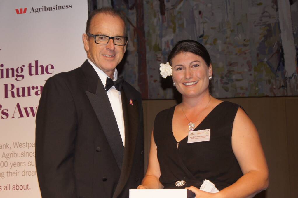 Catherine Marriott with former Agriculture Minister Joe Ludwig, when she was runner up for the national Rural Woman of Year award in 2012.