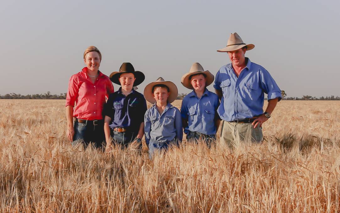 TOP CROP: Mary and Hamish McIntyre, with their children Stirling, Campbell and Finlay. Photo: DUST TO DAWN PHOTOGRAPHY.