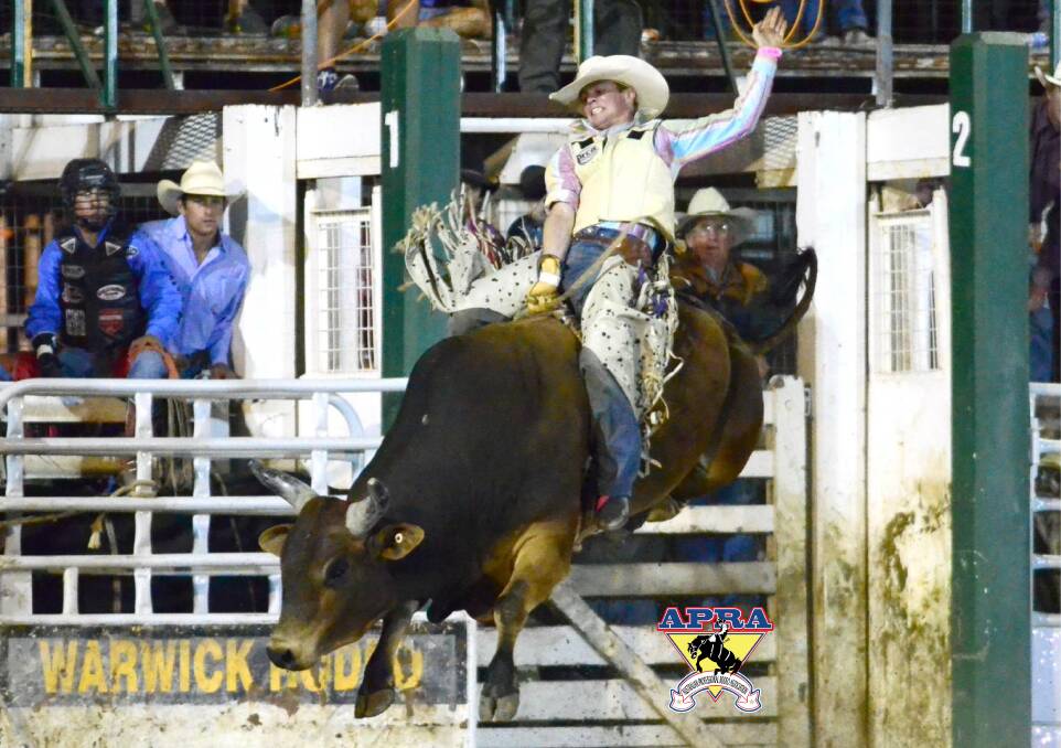 OUT IN FRONT: Beaudesert cowboy Jared Borghero won the Bull Ride at the Mt Isa Rodeo last year to move to the standings lead. Picture: Dave Ethell