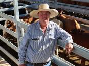 Burnett Livestock & Realty's Paul Hastings with a line of Simbrah steers on account of Neubecker Trust, Dallarnil, that made 362c/kg or $1185.