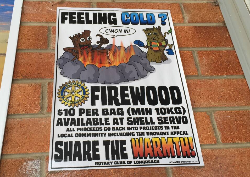 HOT STUFF: The poster advertising firewood in Longreach despite temperatures reaching near 40 degrees Celsius. 