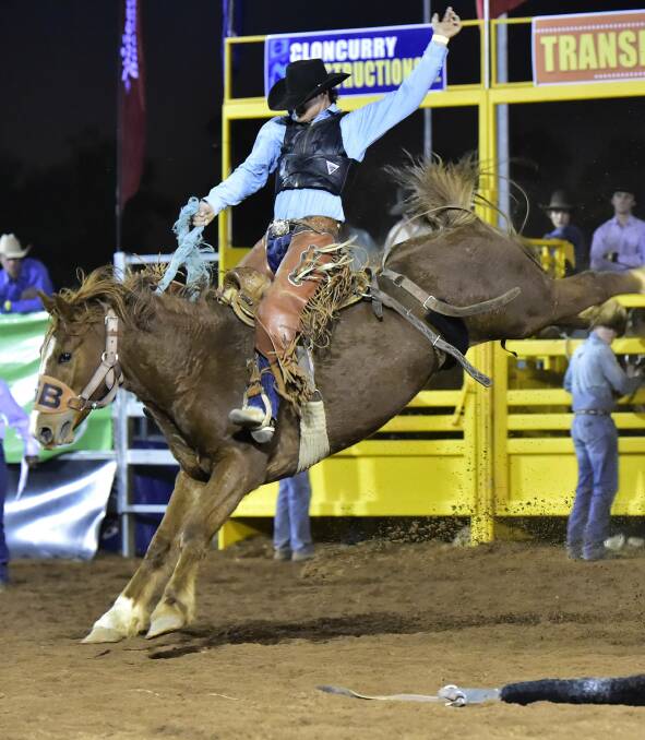 FLYING HIGH: Mitchell rider Greg Hamilton, pitcured on Moves Like Jaggar, goes into the national finals second on the APRA Saddle Bronc standings. Picture: Dave Ethell