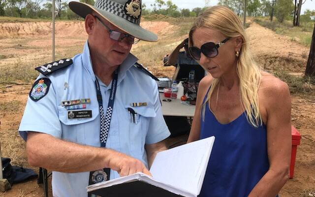 DON'T GIVE UP: Rachel Penno with Inspector Roger Whyte, of Townsville district police, in Charters Towers.