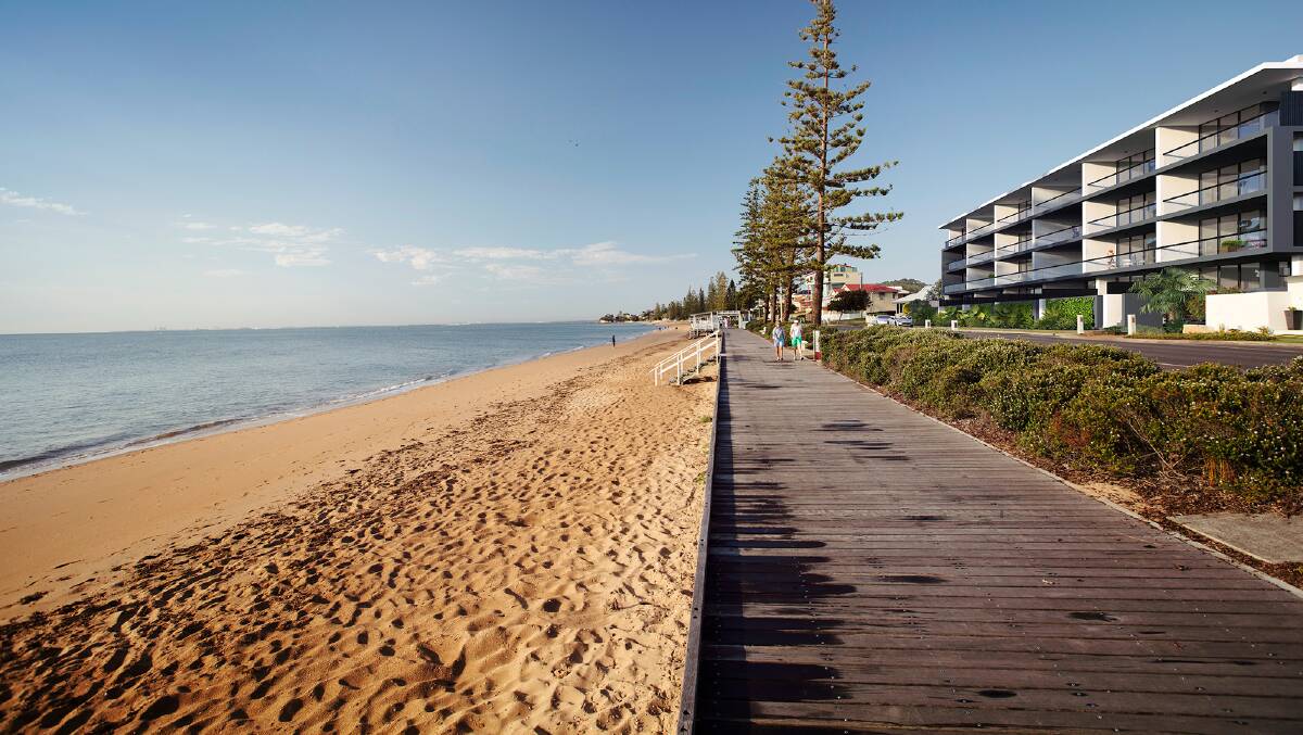 Margate Beach features soft white sand and a scenic timber boardwalk that stretches along the coastline for leisurely strolls.

