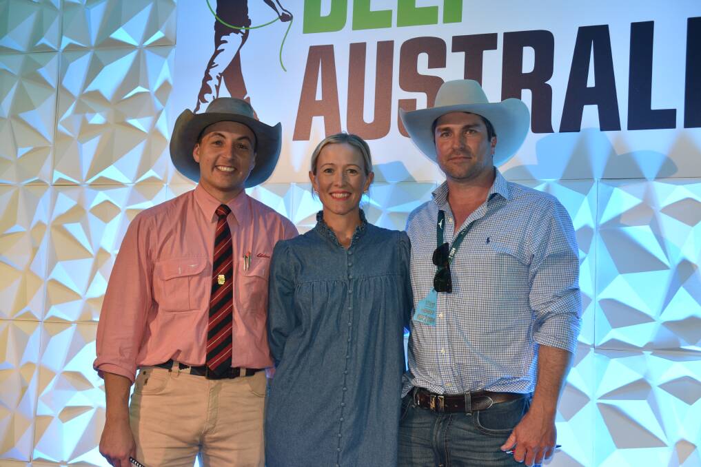 Elders' stud stock's Lincoln McKinlay, with vendors Cameron and Hannah Hewitt of HP Wagyu, Taroom, who sold the top price Wagyu bull for $50,000. Picture: Ben Harden 