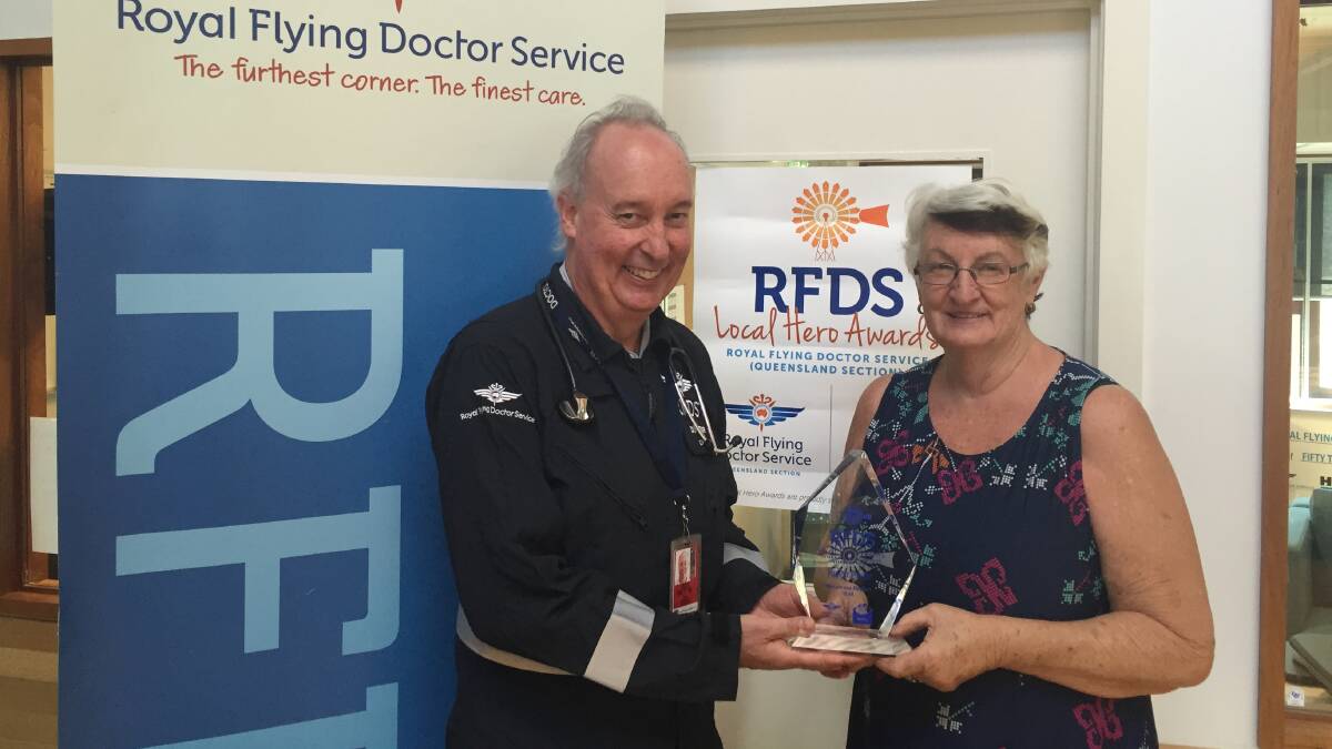Doctor Don Bowley presents Pam Forster her Local Hero award on Monday.