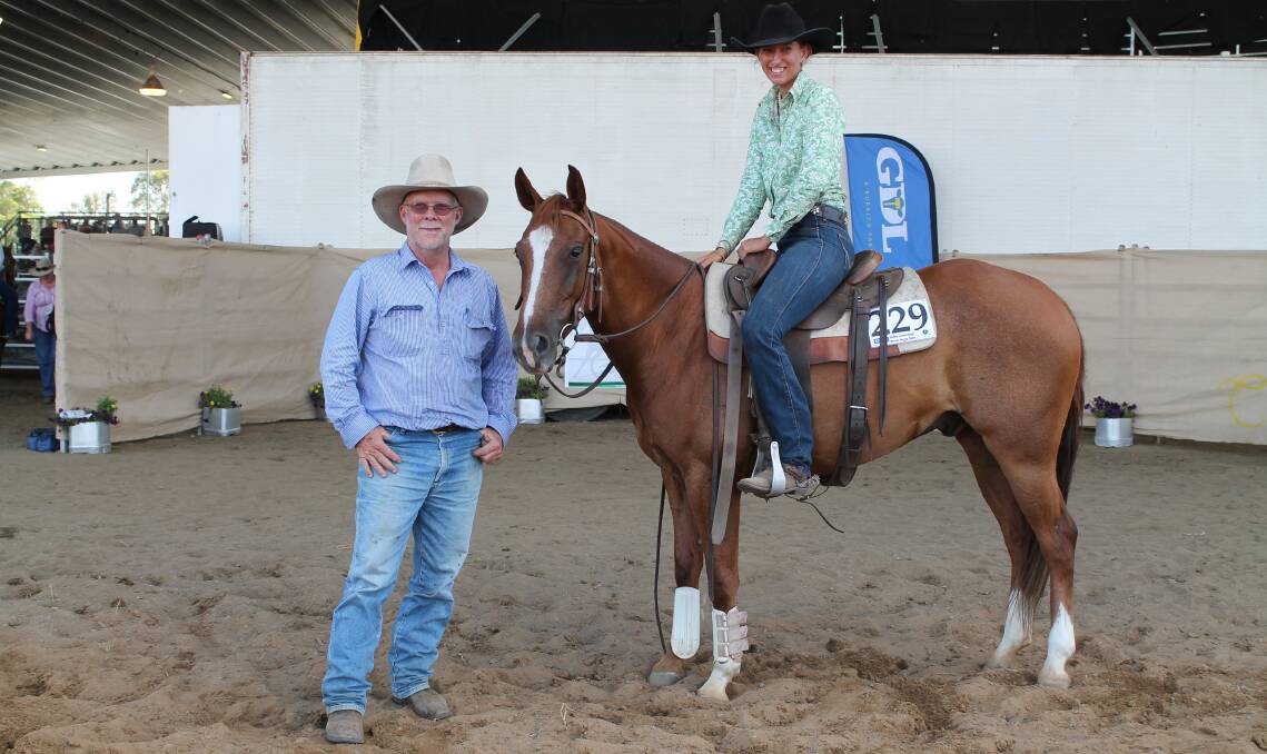 Mundubbera trainer Leah Read aboard her $20,000 top selling gelding, Marnies Token Acres, which was bought by Tony Dawson of Warra at last year's Dalby ASH sale.