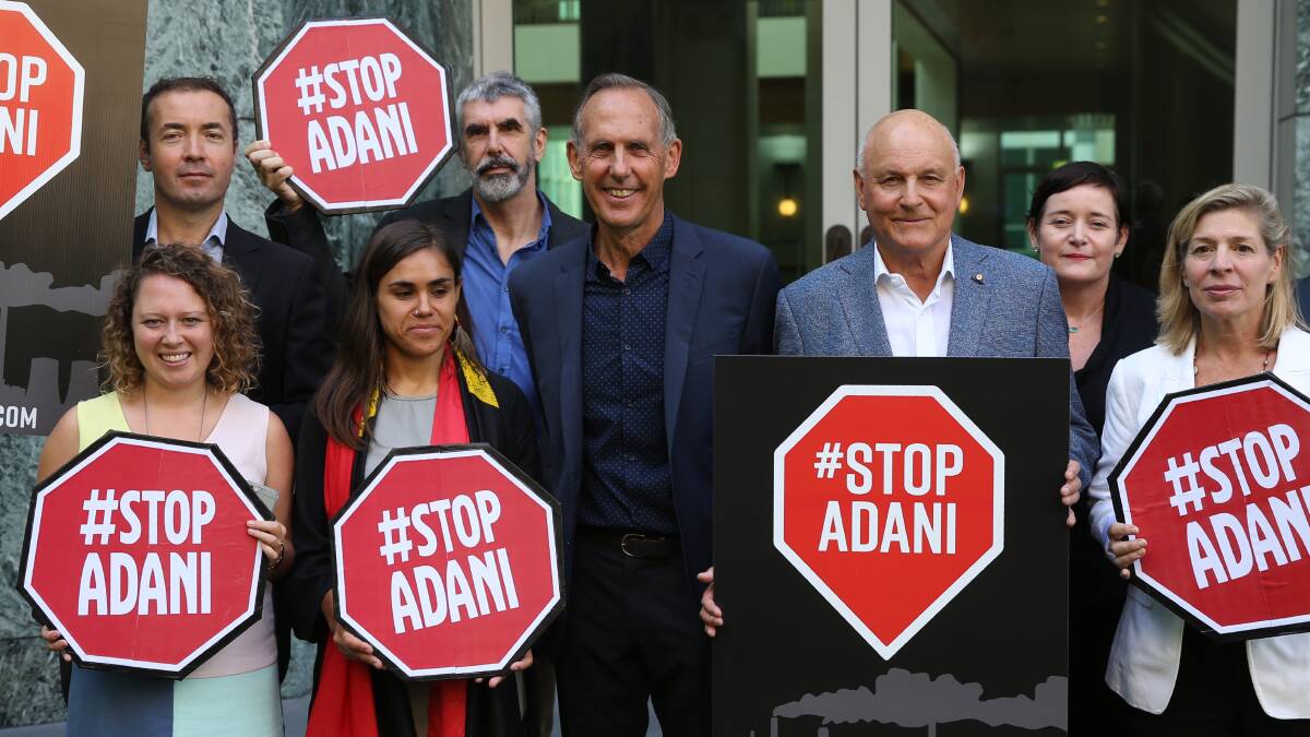 Bob Brown returned to Parliament House in Canberra with Geoff Cousins and environmental groups to protest against the Adani coal mine on March 22. Photo: Andrew Meares