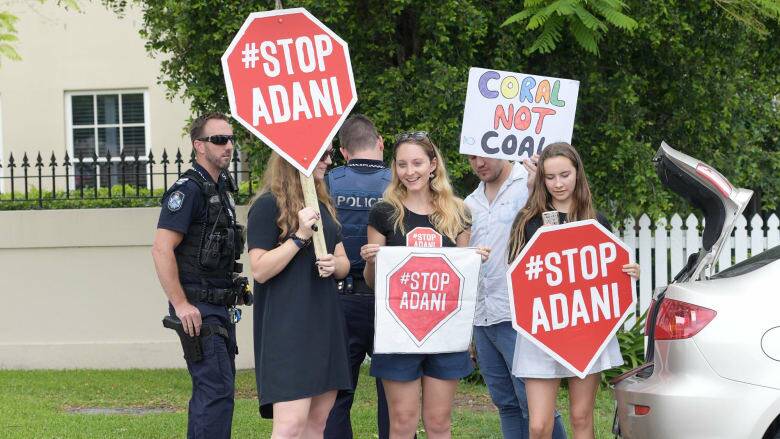 Anti-Adani coal mine protesters dogged candidates throughout the Queensland state election campaign. Photo: AAP